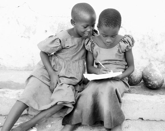 Harusi and Hadija Doing Homework